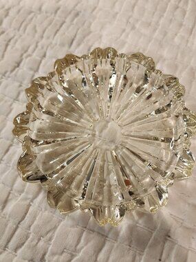 Hazel-Atlas clear glass ashtray likely from the 1940s
